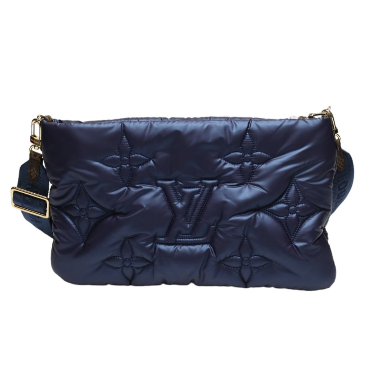 Navy quilted handbag with gold accents on a white background