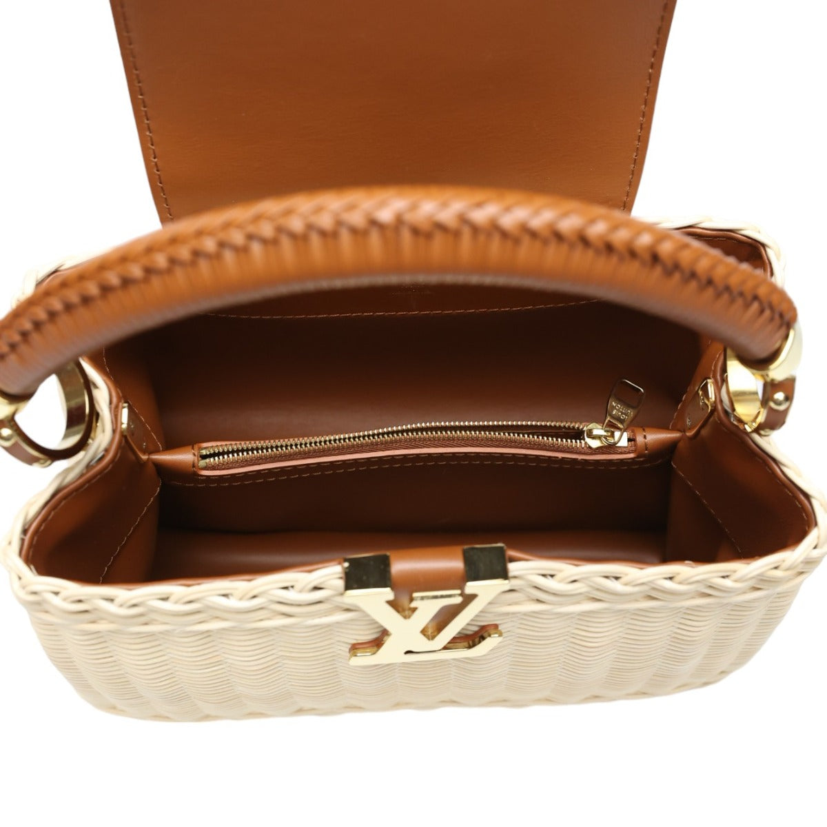 Brown handbag with woven base and gold zipper, featuring a brand logo.