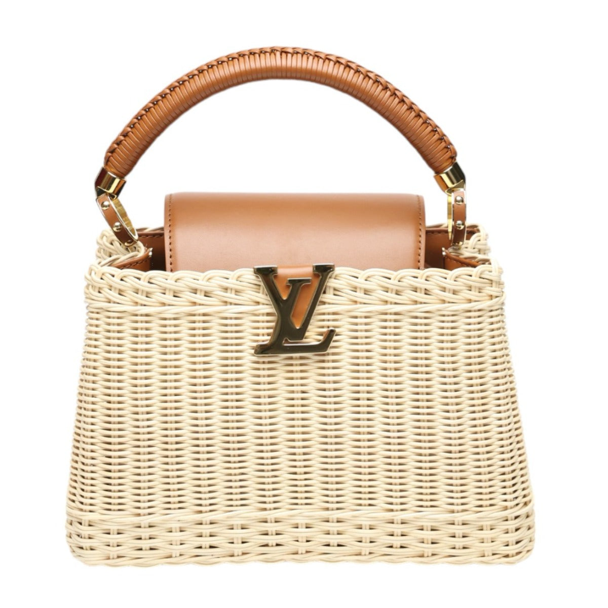 Wicker handbag with brown leather accents and gold hardware on a white background