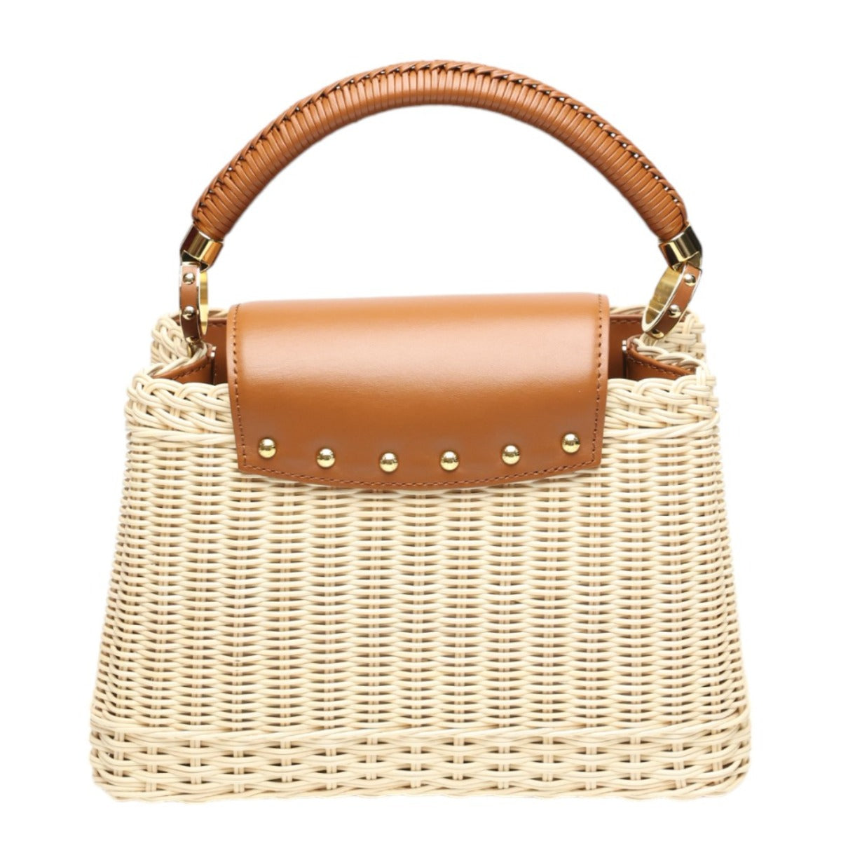 Wicker handbag with brown leather accents on a white background