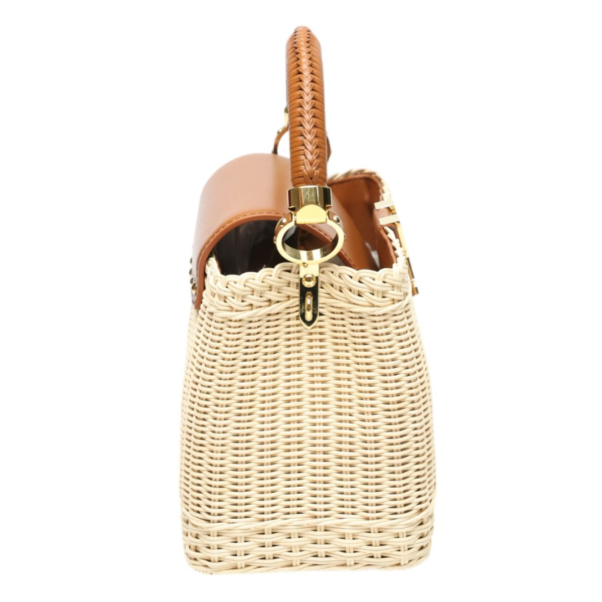 Wicker handbag with brown leather handle and gold clasp on a white background