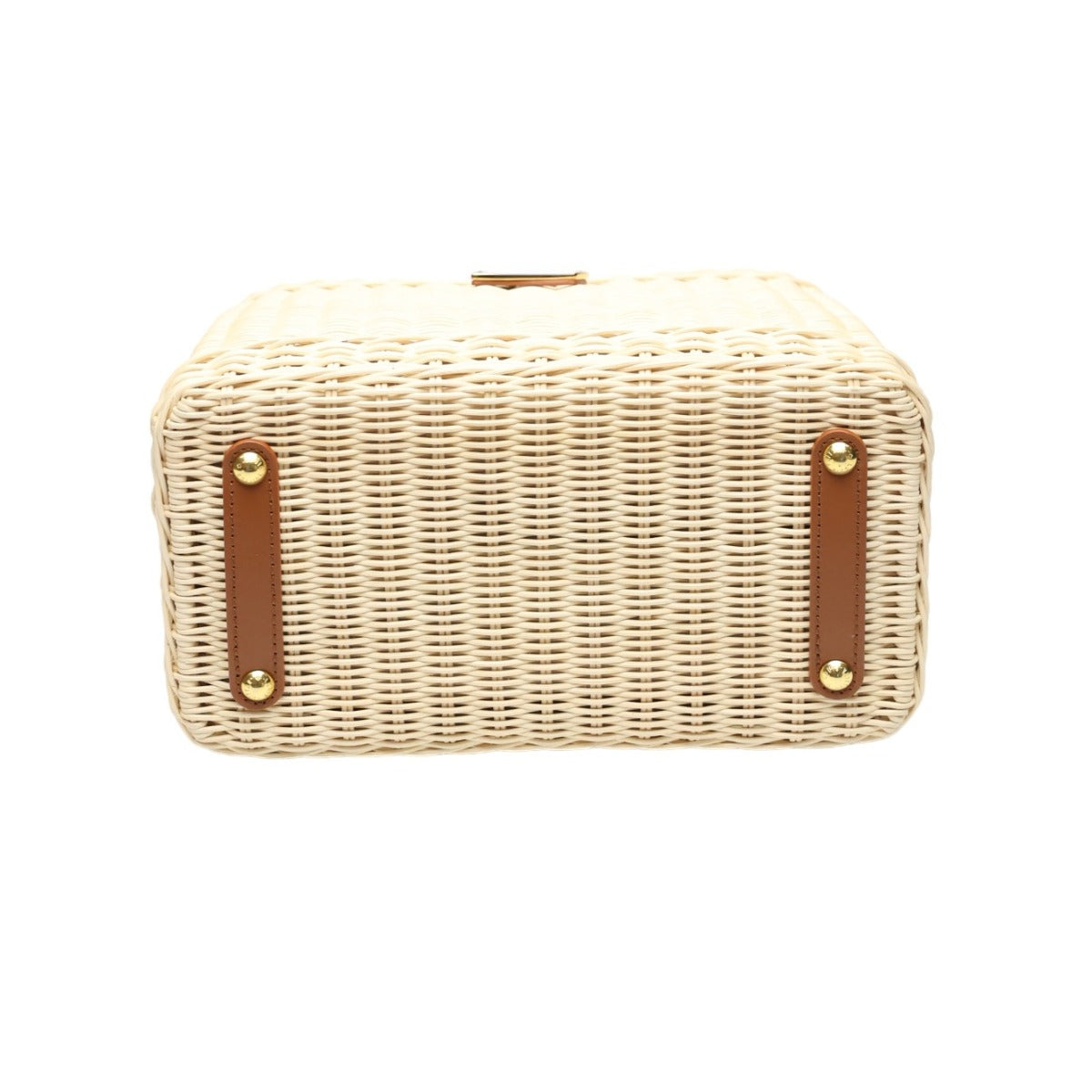 Wicker handbag with brown straps on a white background