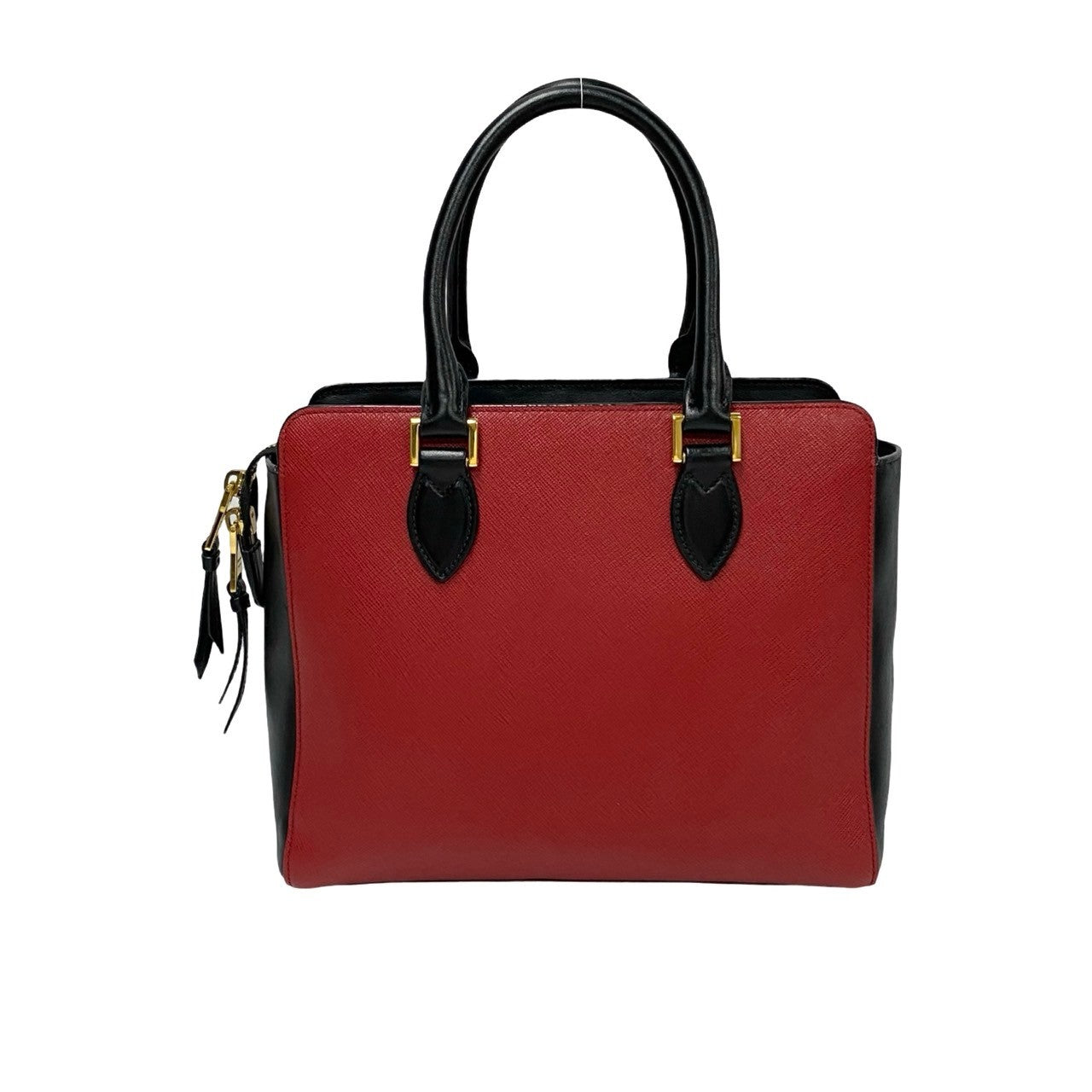 Red handbag with black accents on a white background