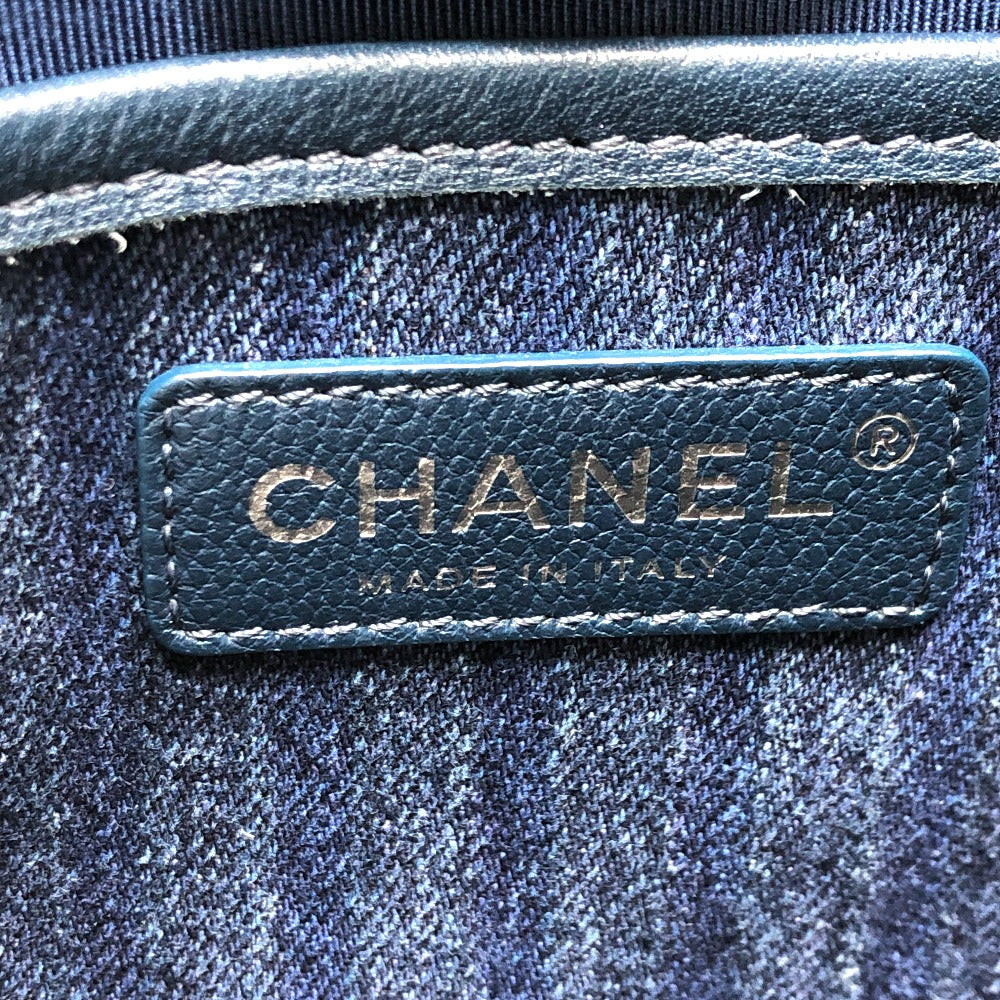 Chanel logo on a blue textured background