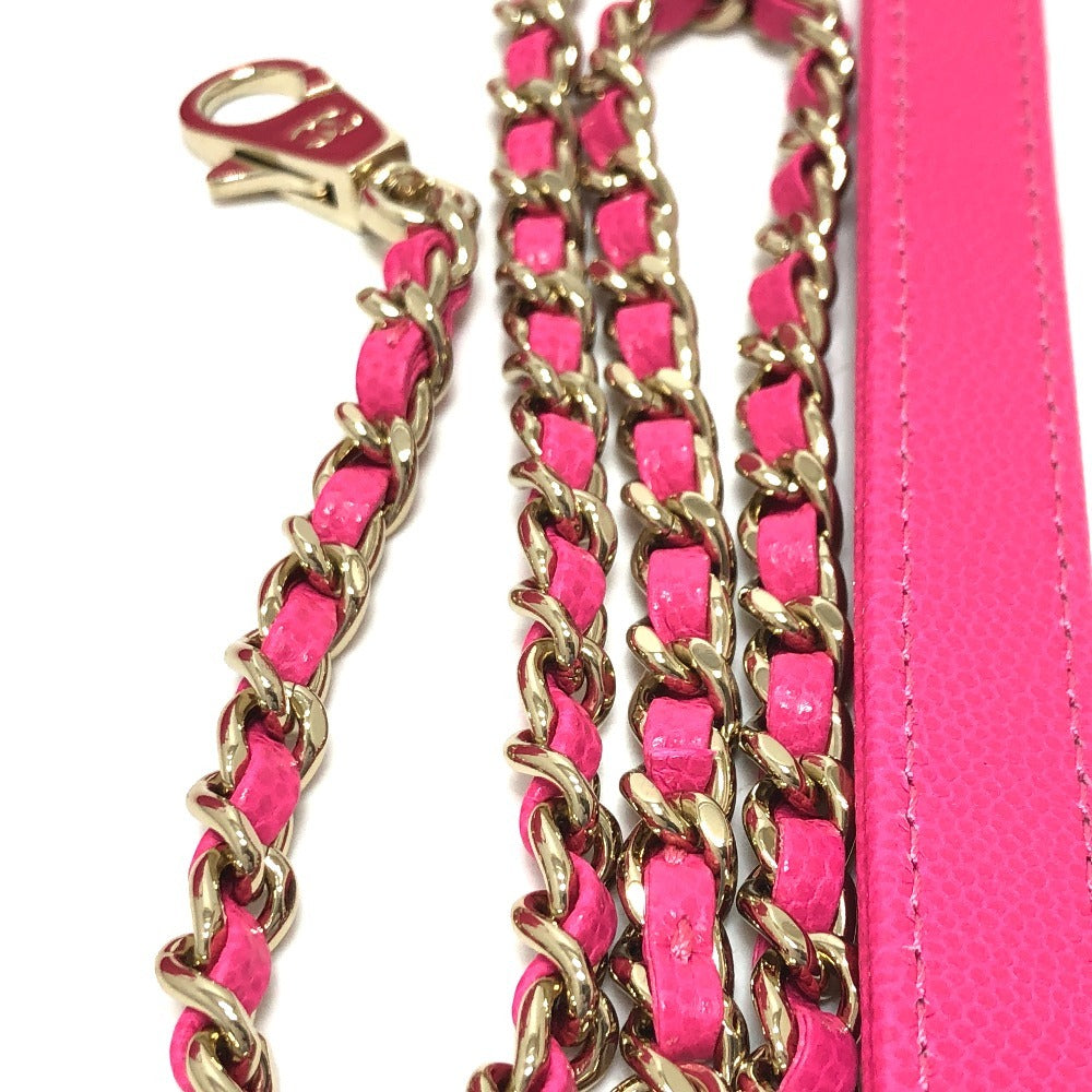Pink and gold chain strap on a white background