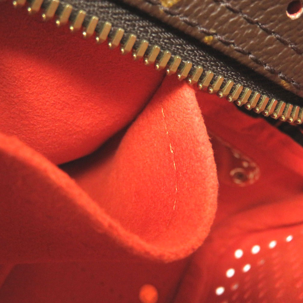 interior pocket Louis Vuitton Perforated Monogram Mini Trocadero Orange