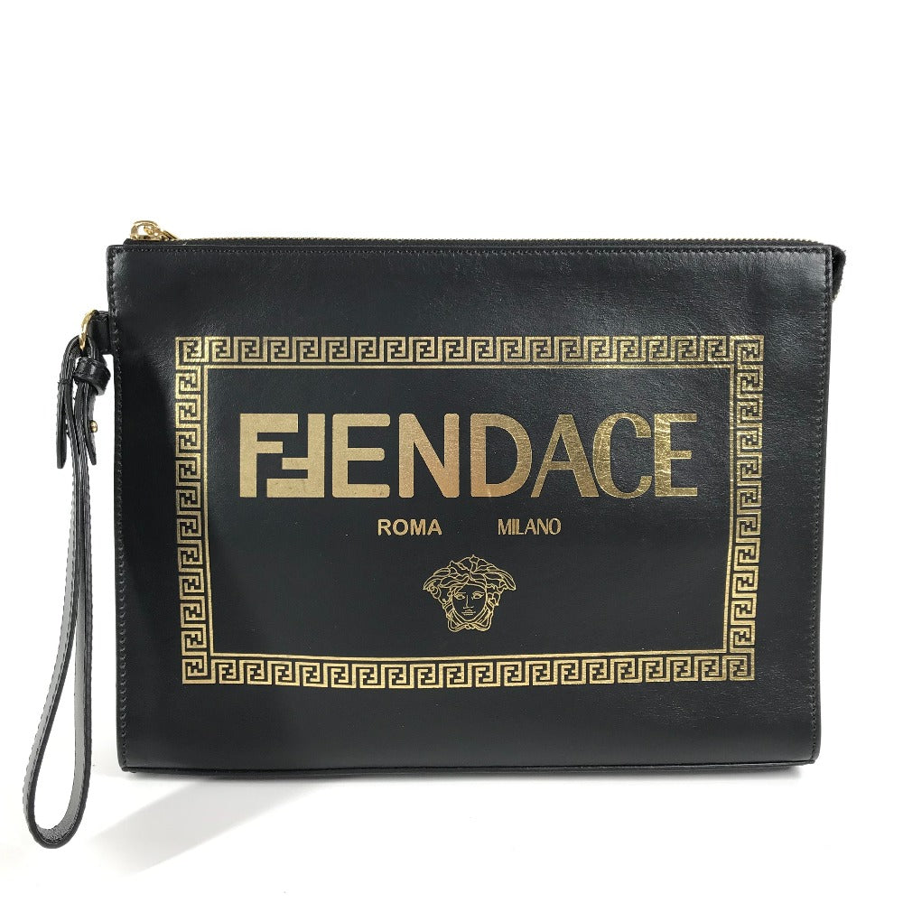 Black clutch bag with gold 'FENDACE' text and logo on a white background