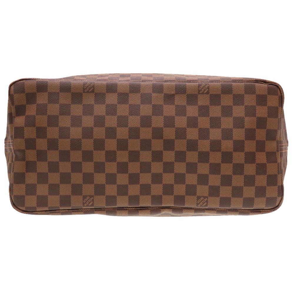 Brown checkered handbag on a white background