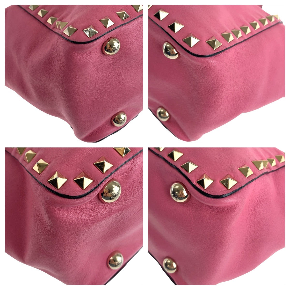 Pink leather bag with gold studs and buttons on a white background