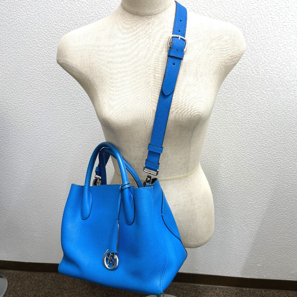 on model Christian Dior Grained Calfskin Large Open Bar Tote Blue