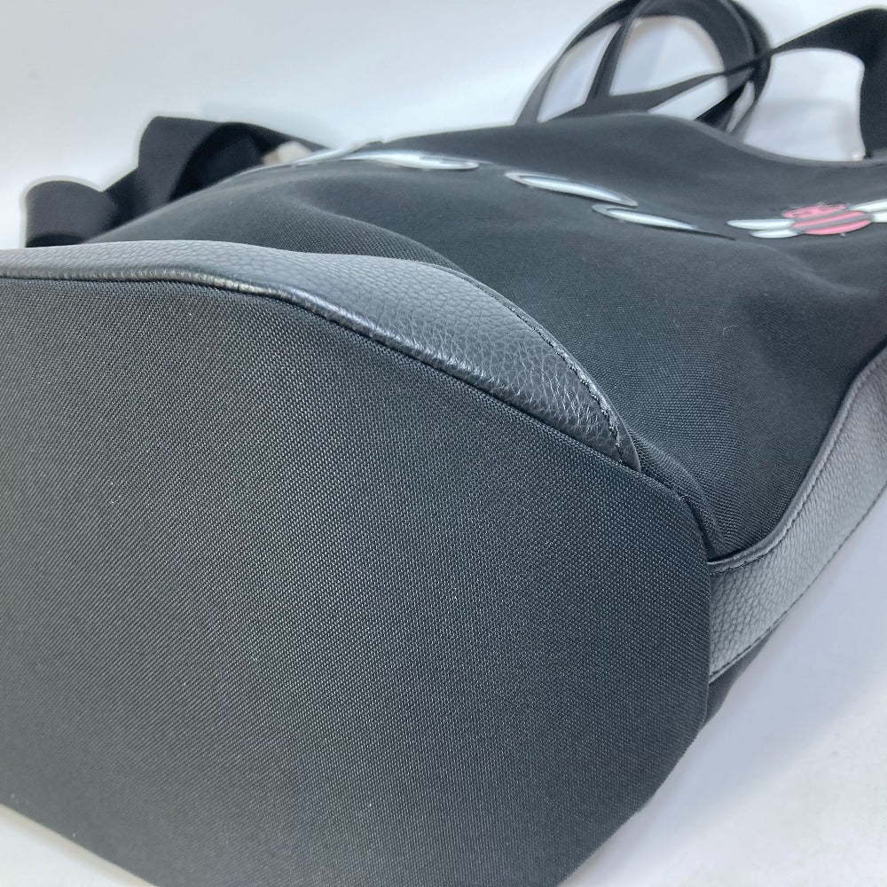 corner two Christian Dior X KAWS Nylon and Calfskin Logo Bee Tote Black