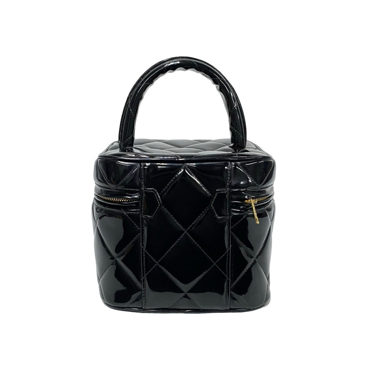Black quilted handbag on a white background