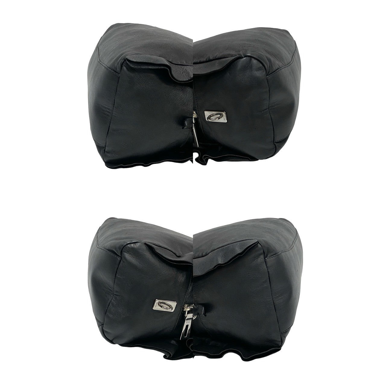 Two black bean bags with zippers on a white background