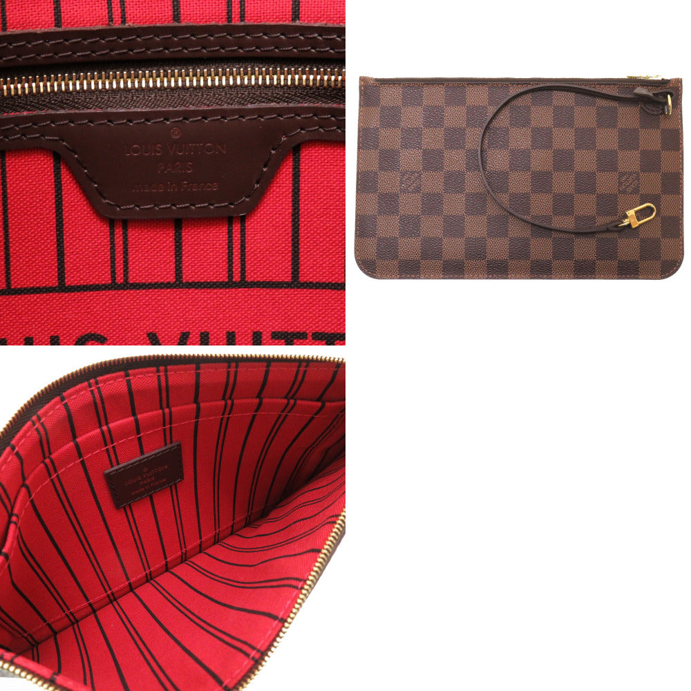 Close-up of a red and black patterned handbag with a brown interior and gold zipper, alongside a brown checkered pouch.