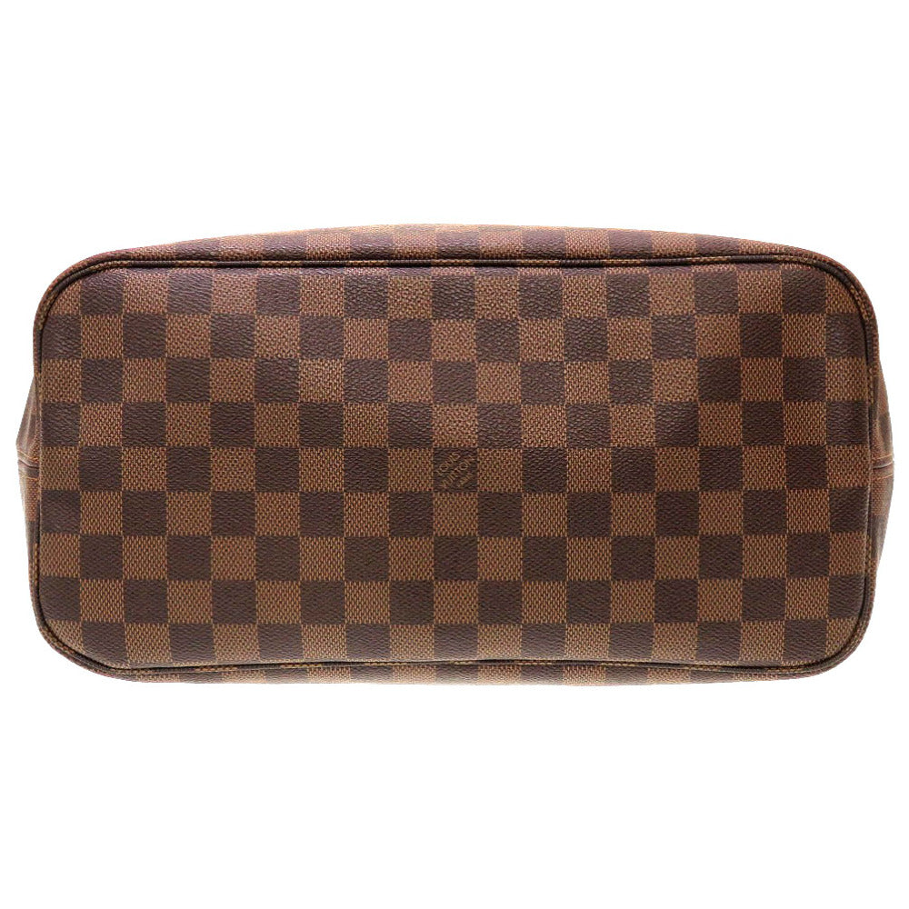 Brown checkered toiletry bag on a white background