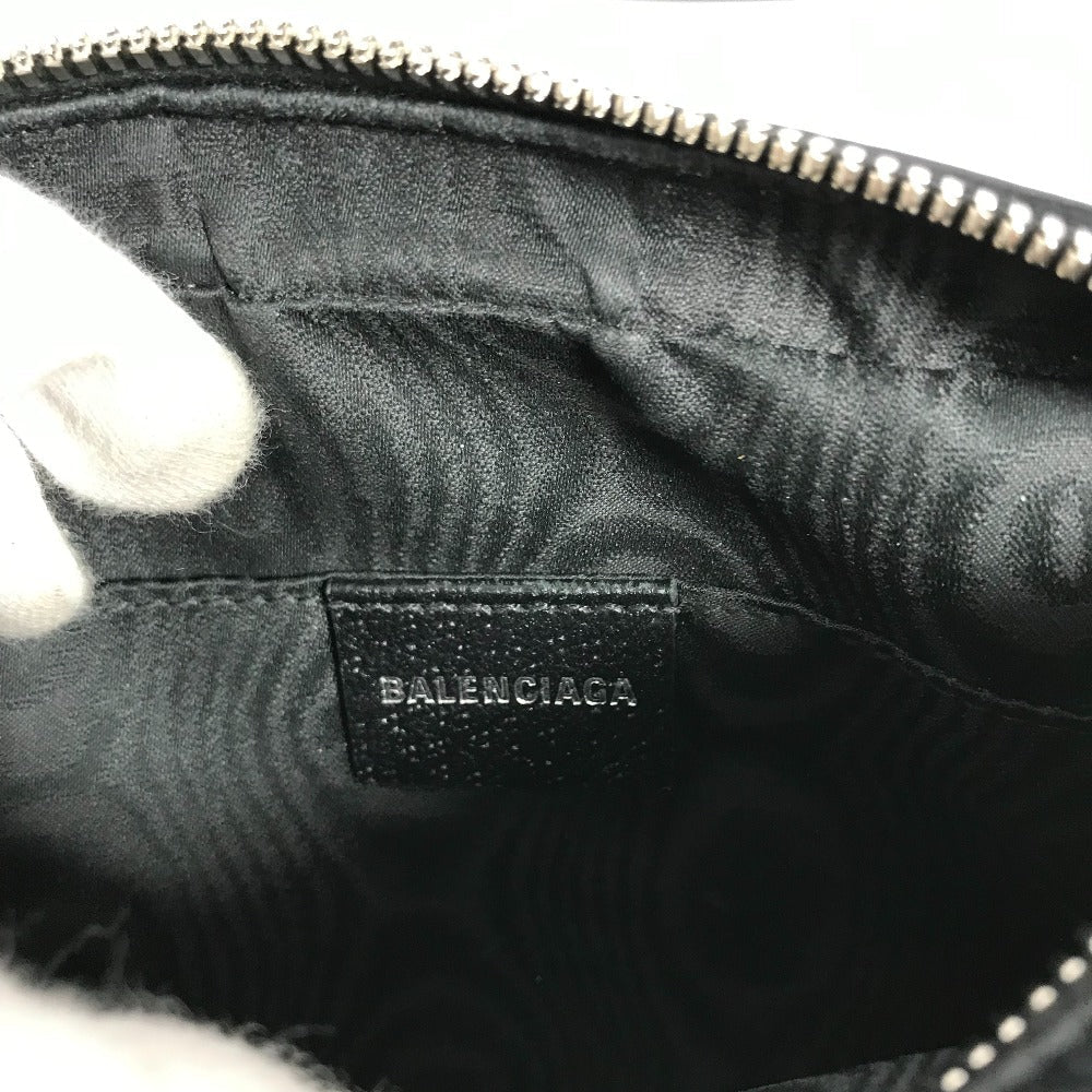 Close-up of a Balenciaga bag with a visible brand label.