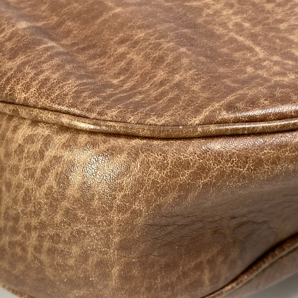 Close-up of a brown leather surface with visible texture