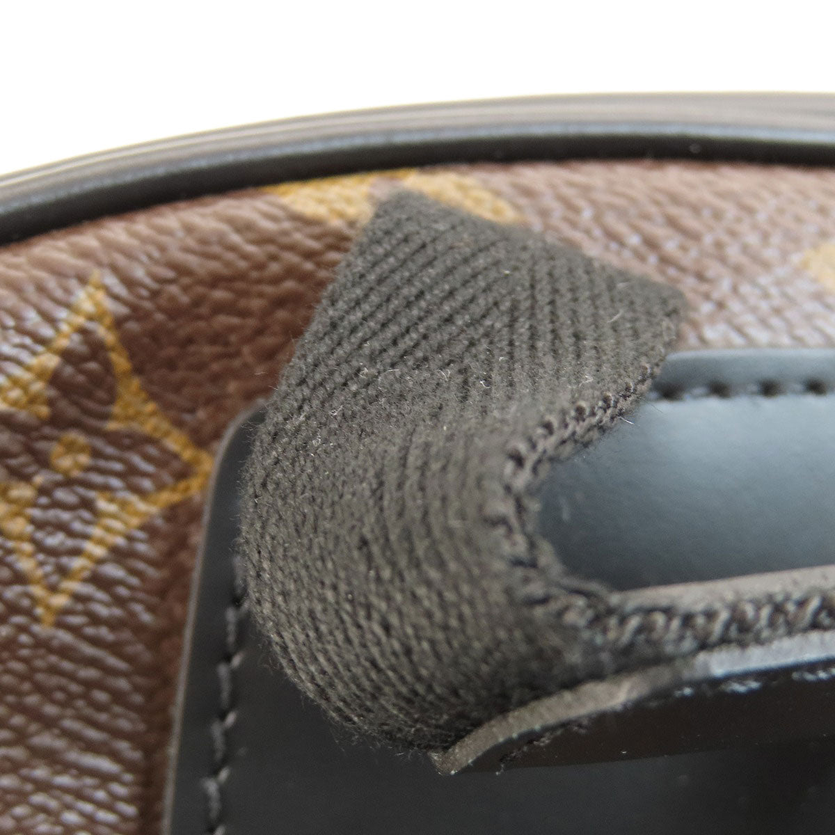 Close-up of a shoe's sole with a star design on the side.