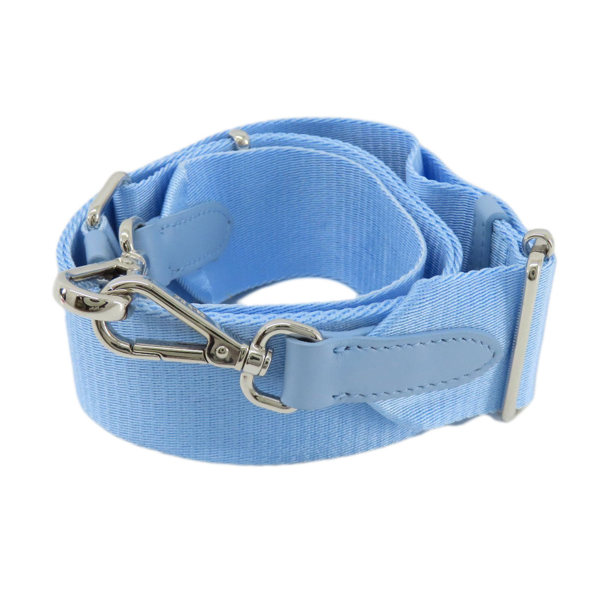 Light blue strap with silver hardware on a white background