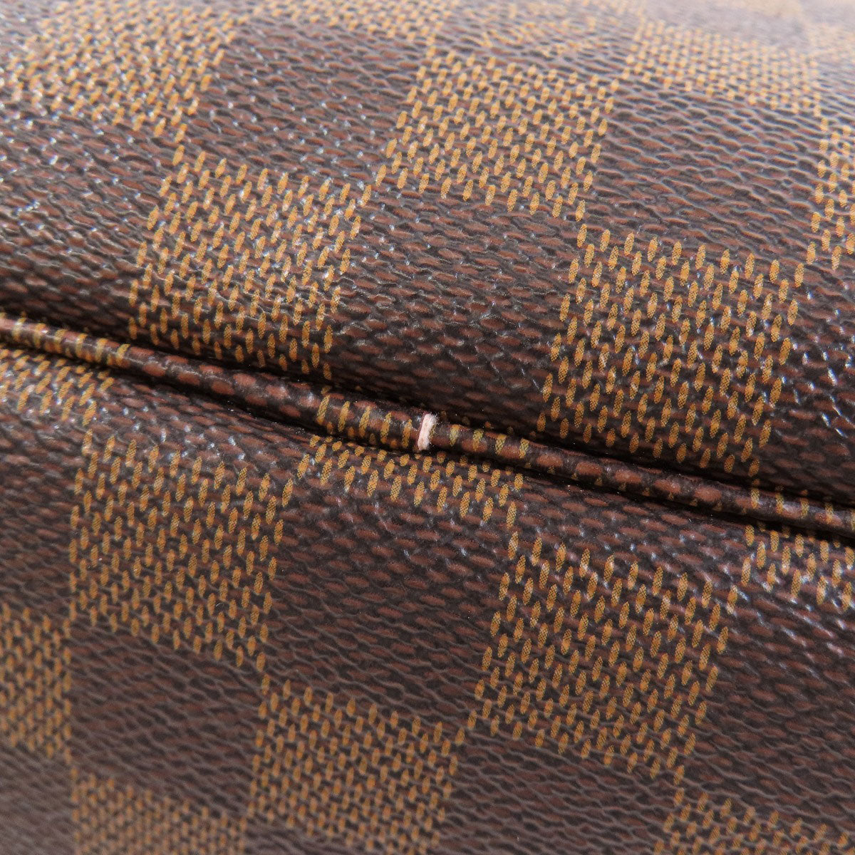 Close-up of a brown and beige checkered patterned surface