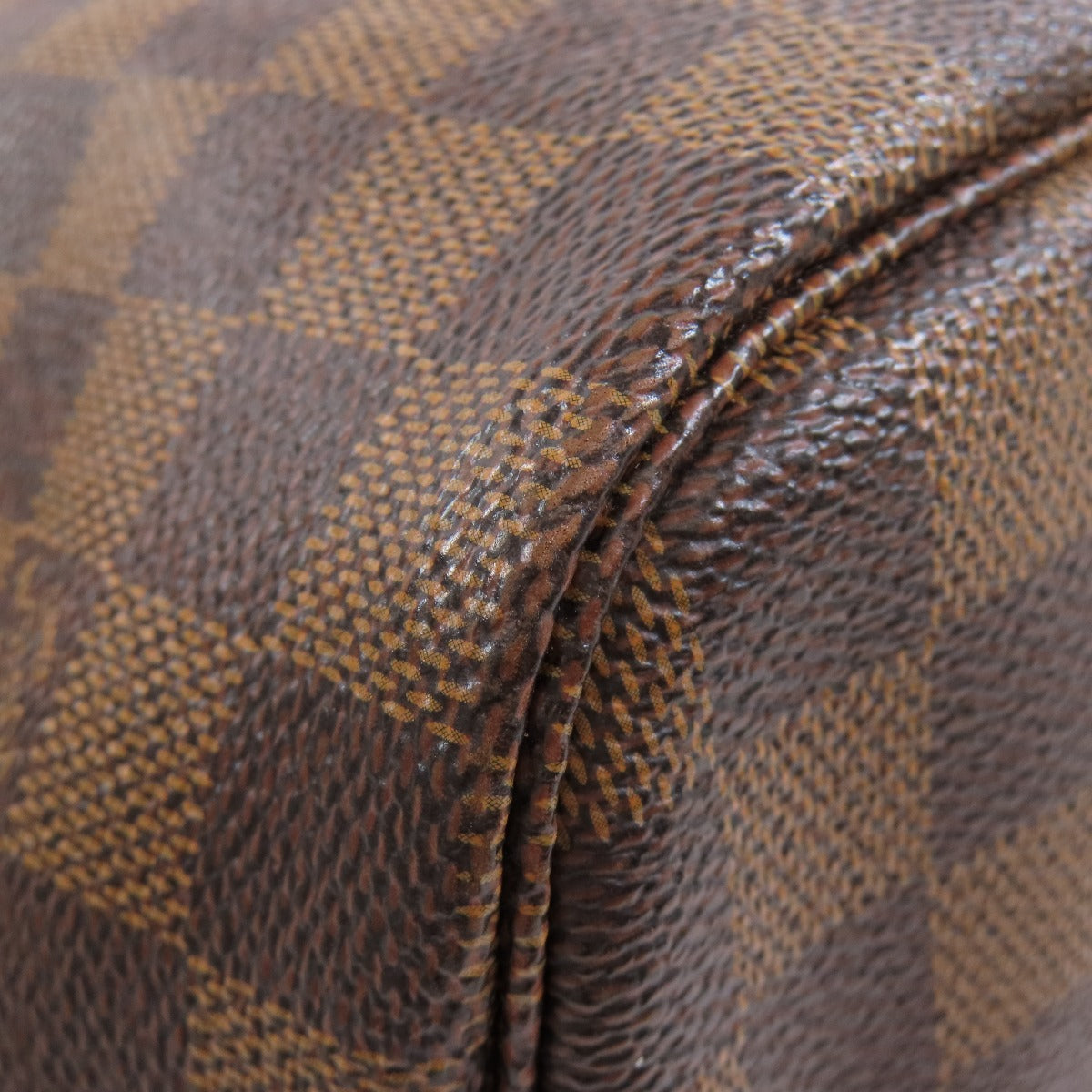 Close-up of a brown checkered fabric surface
