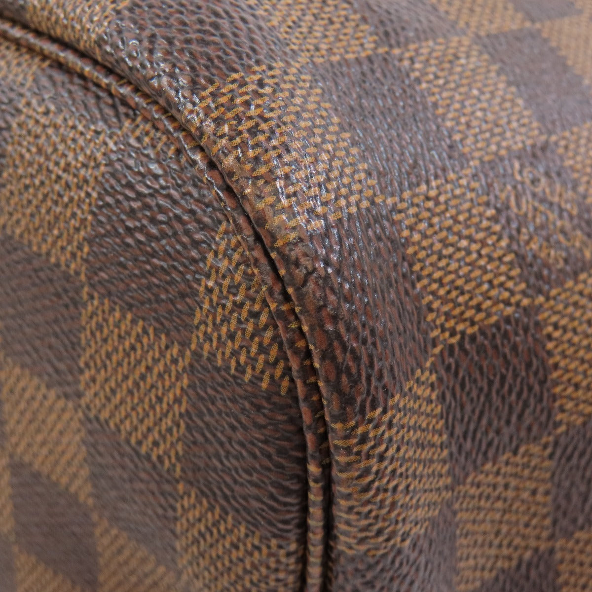 Close-up of a brown and black checkered patterned surface