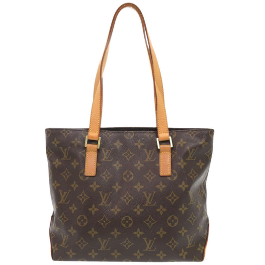 Brown handbag with tan straps on a white background
