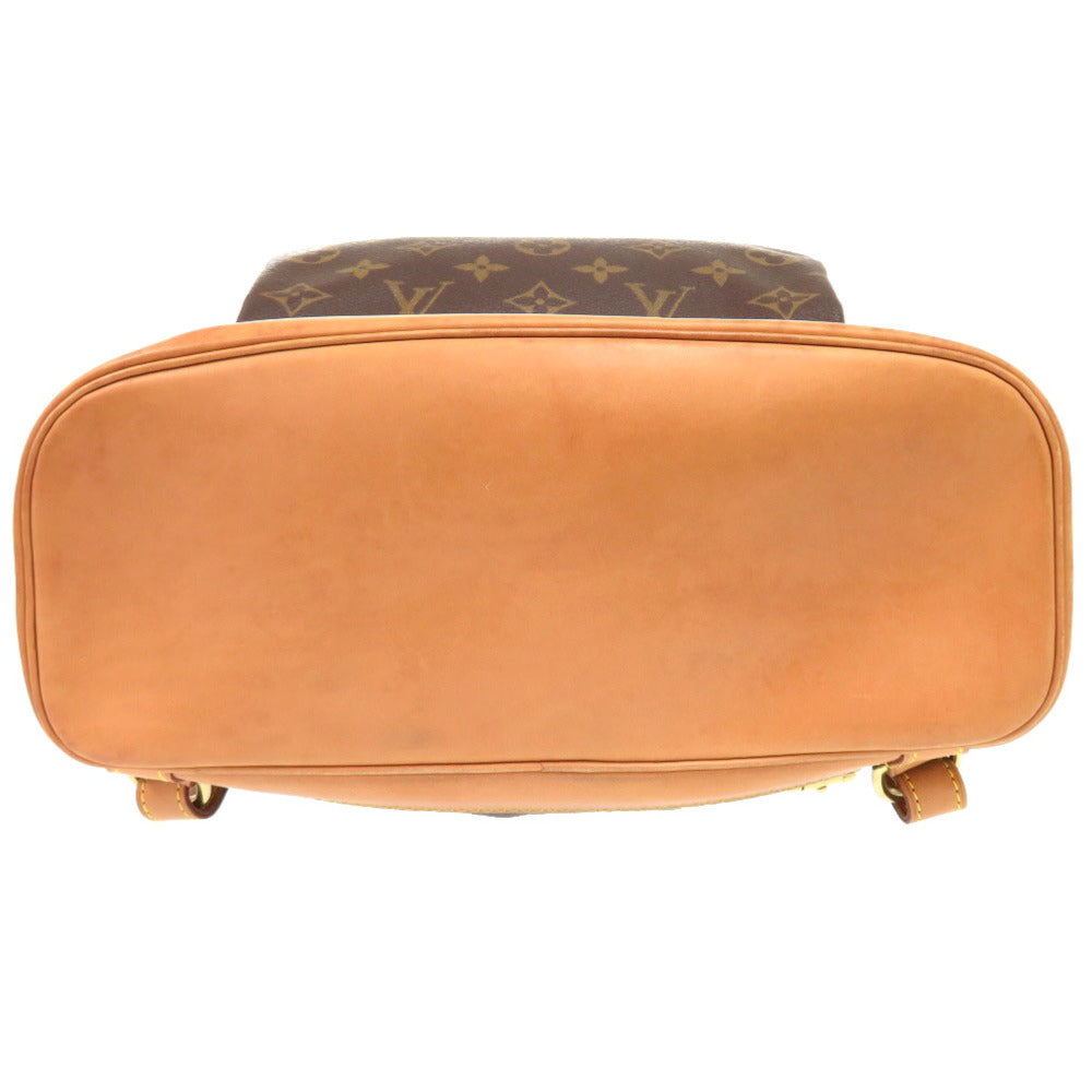 Brown suitcase with monogram pattern on a white background