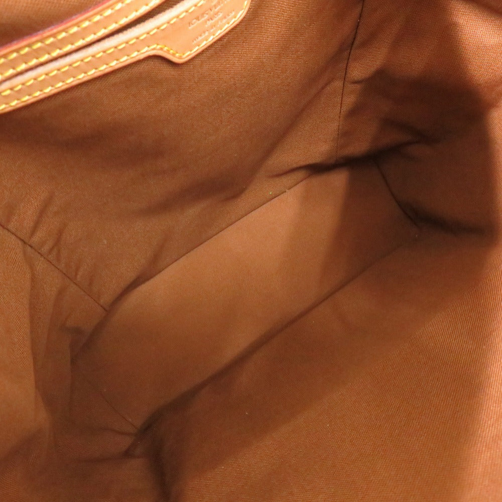 Close-up of brown fabric with visible stitching