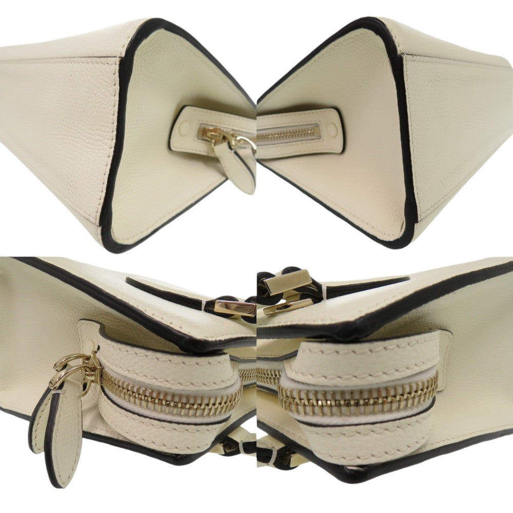Beige leather handbag with gold zipper and black trim, shown from multiple angles.