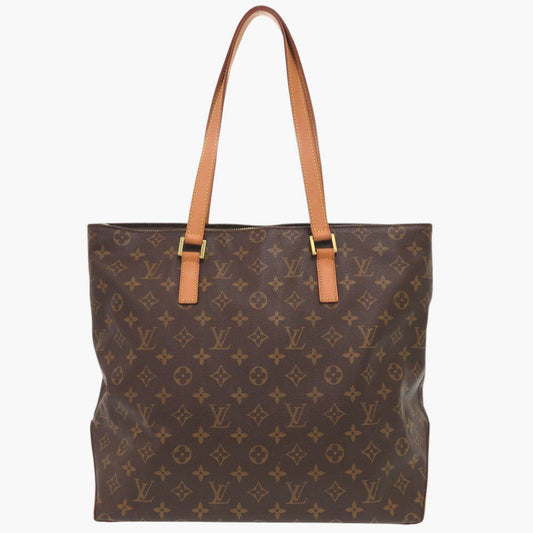 Brown tote bag with tan handles on a white background