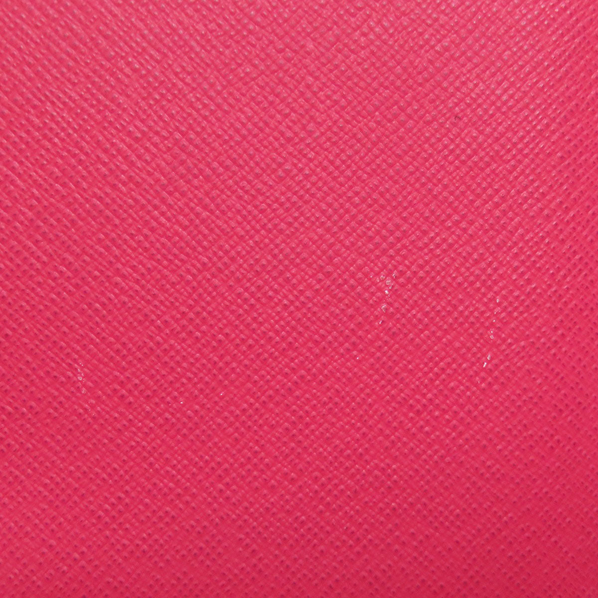 Close-up of a textured pink fabric surface