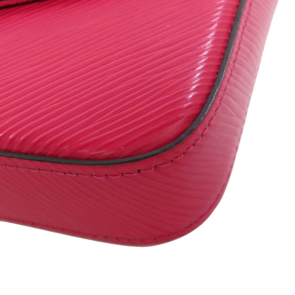 Close-up of a pink textured case with a white background