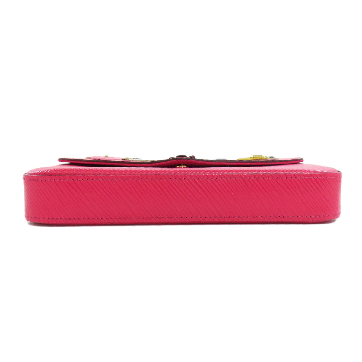 Pink wallet with a textured pattern on a white background