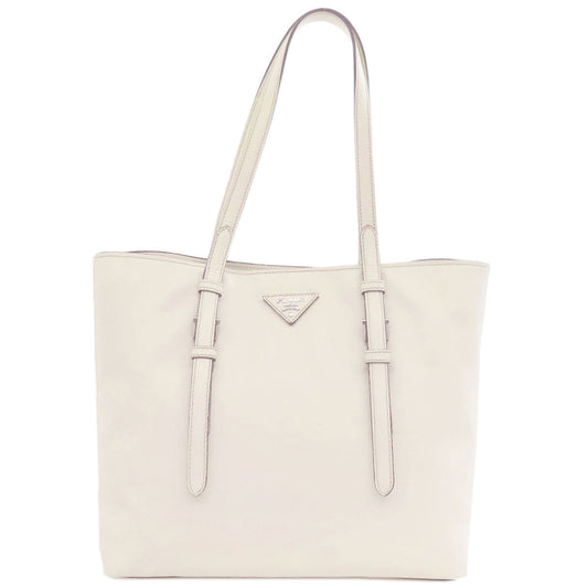 White tote bag with Prada logo on a white background
