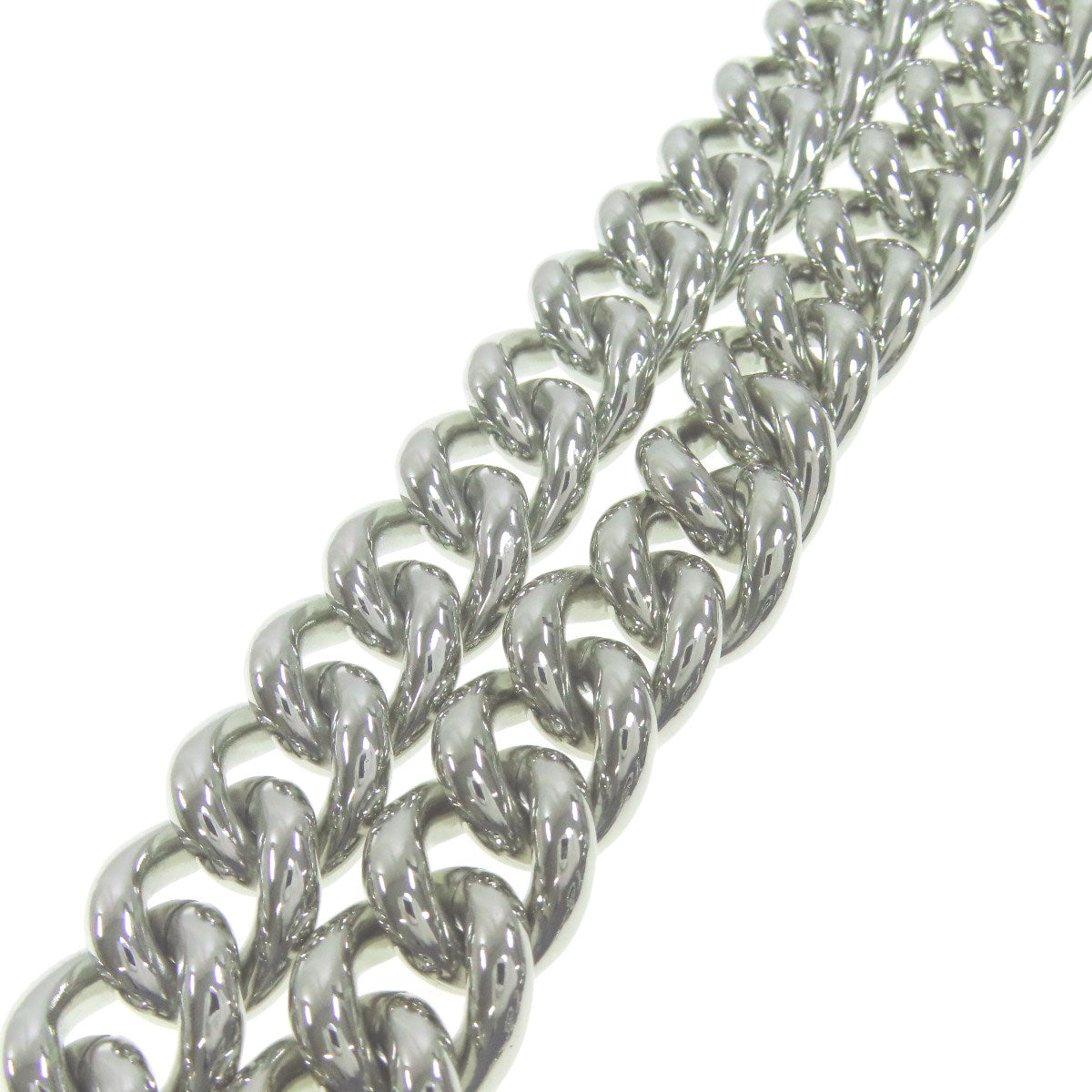 Silver chain bracelet on a white background