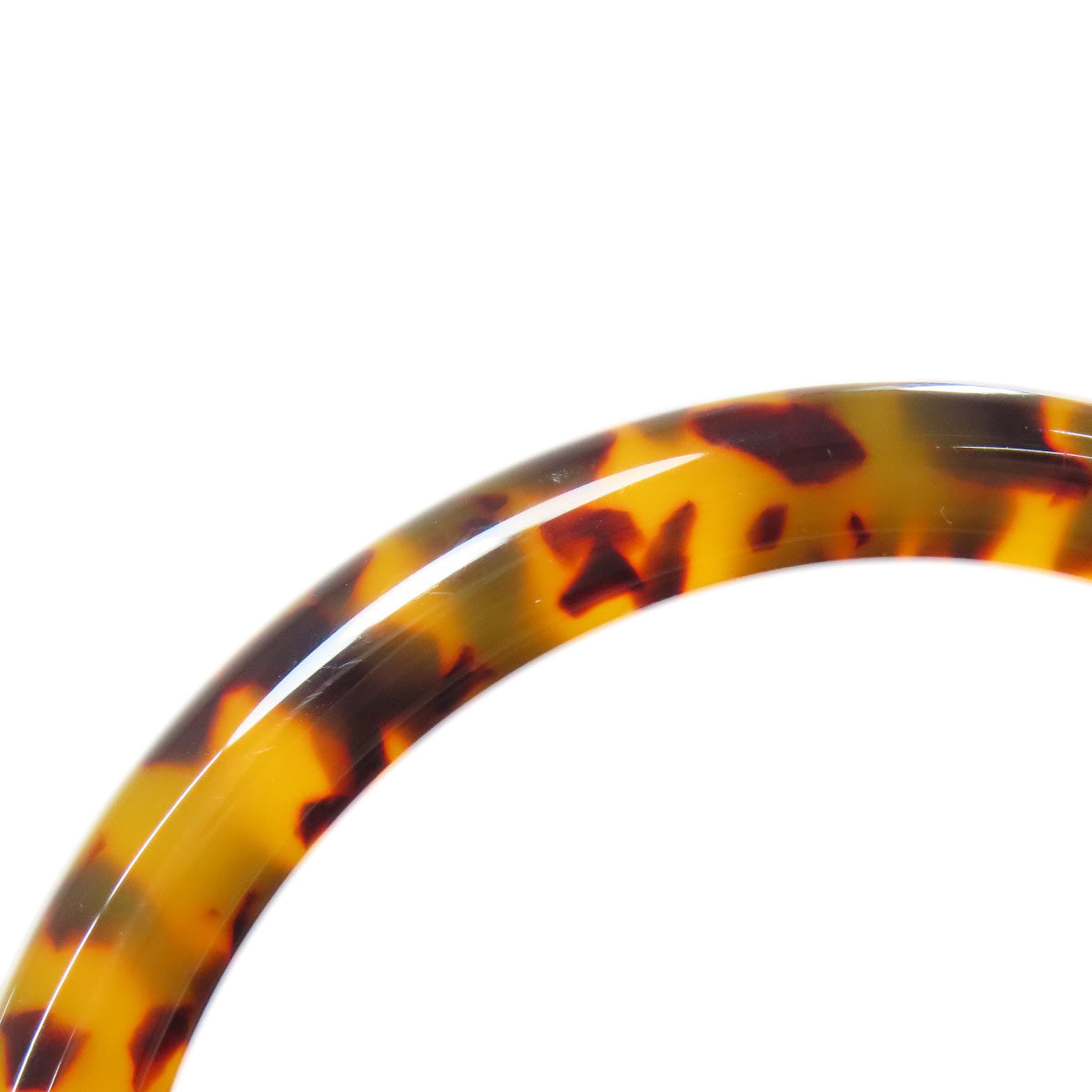 Tortoiseshell hair hoop on a white background