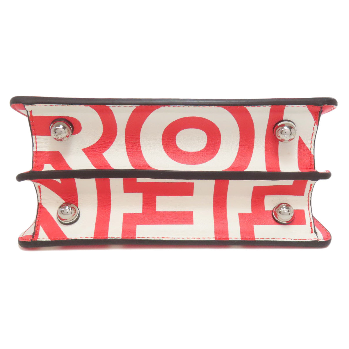 Red and white patterned product with metallic accents on a white background