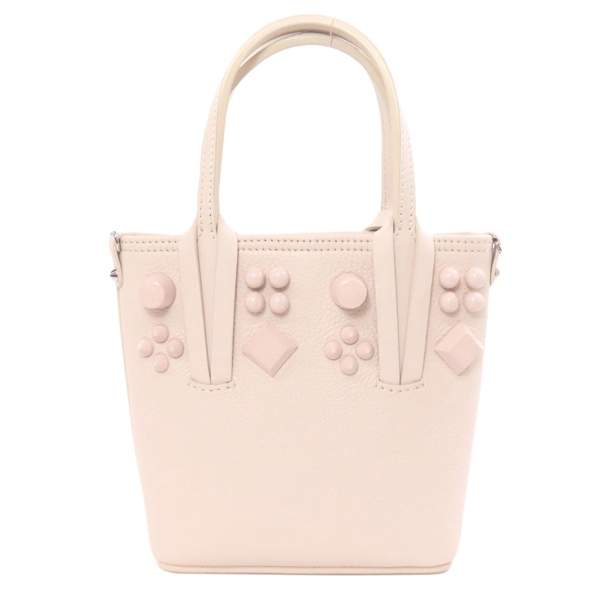 Pink handbag with decorative elements on a white background