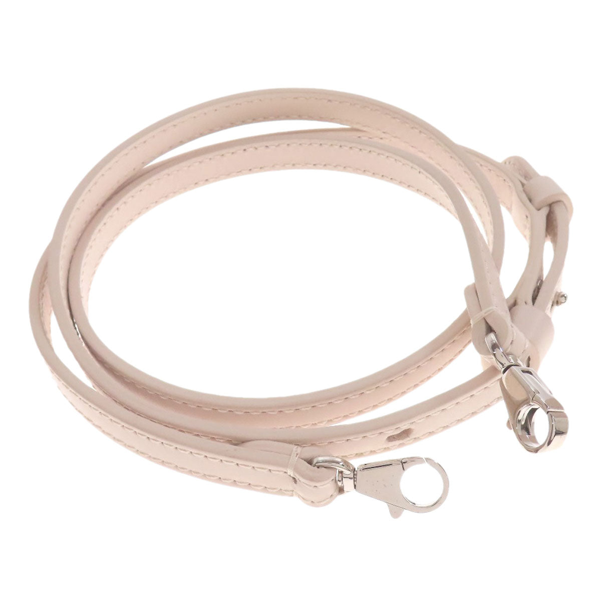 Beige leather dog leash with metal clasp on a white background
