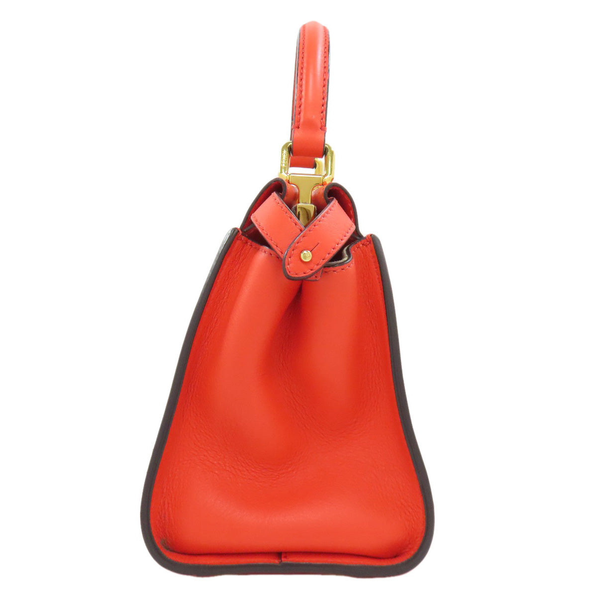 Red handbag with gold clasp on a white background