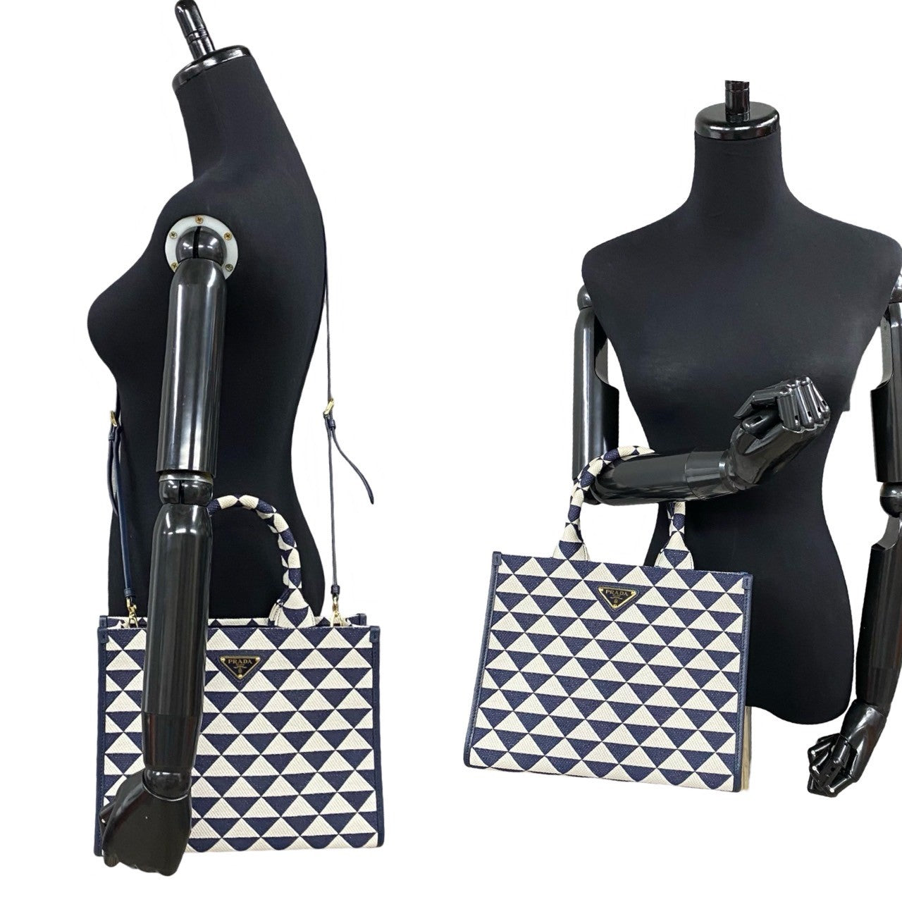 Two handbags on black mannequin stands with a geometric pattern.