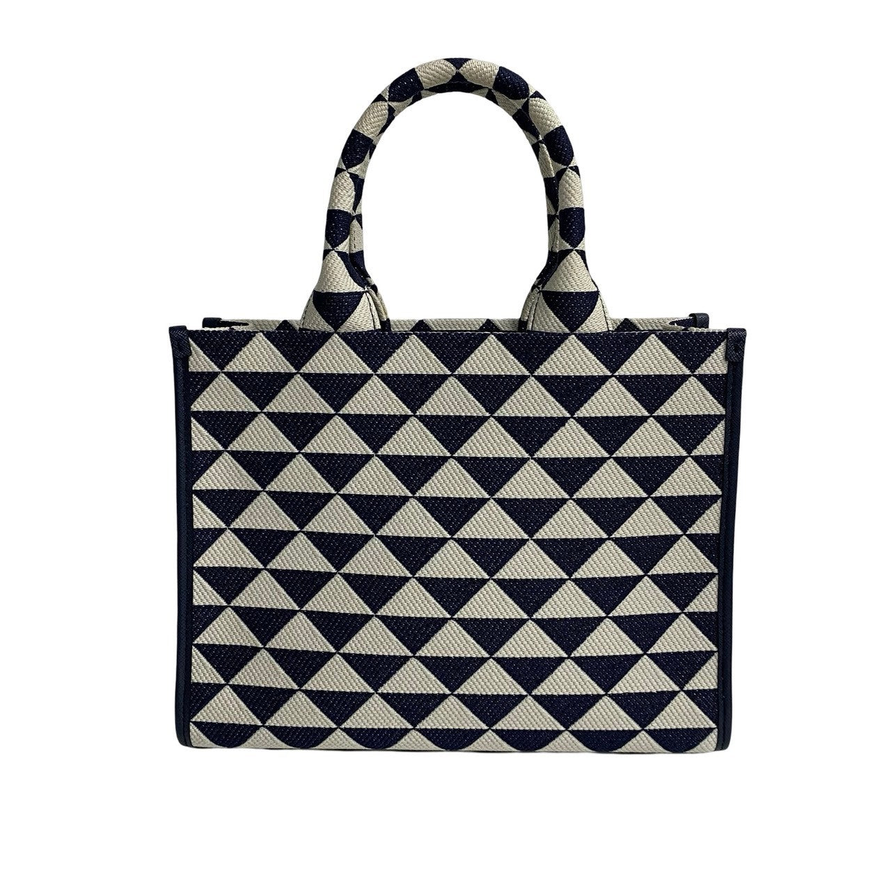Tote bag with navy and white geometric pattern on a white background