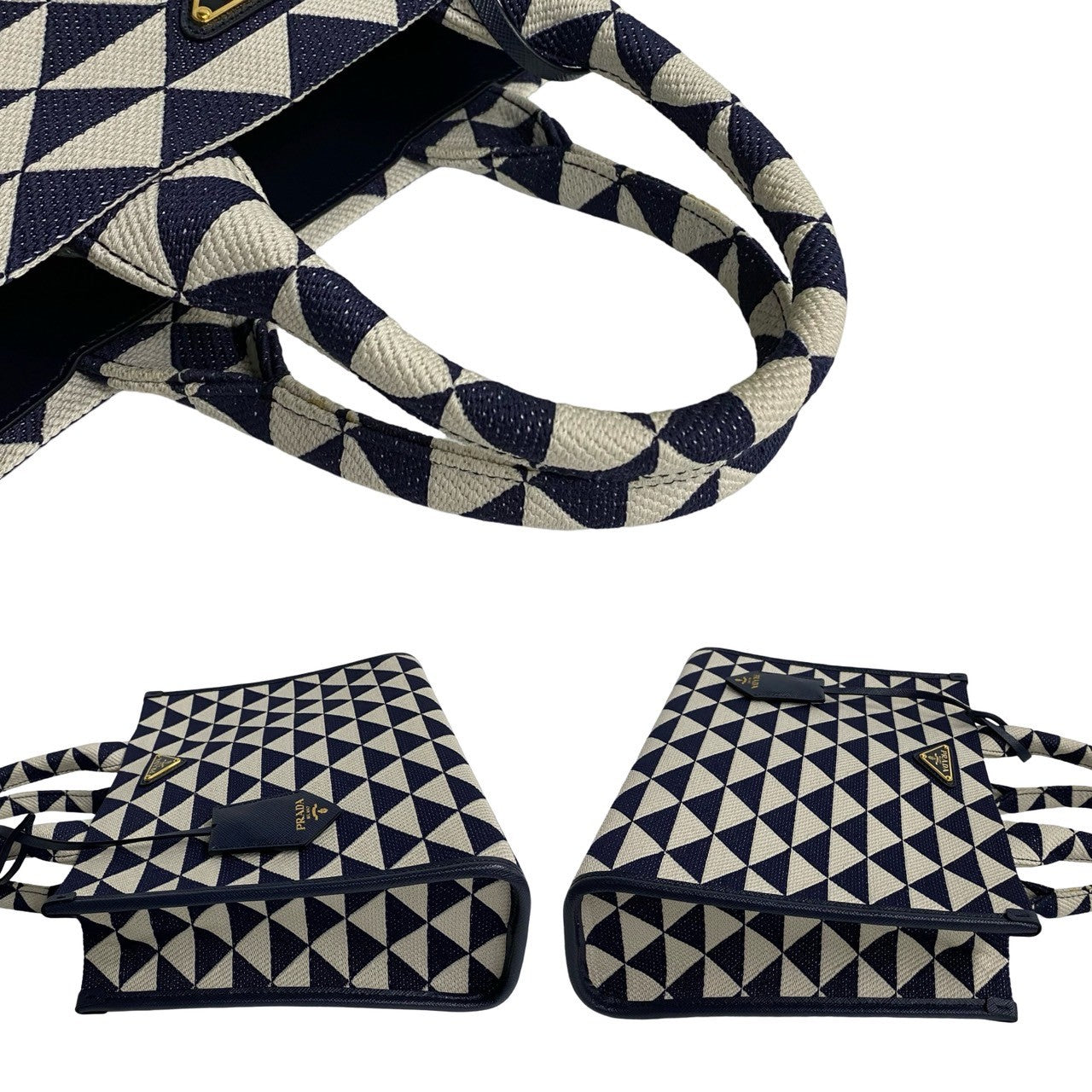 Black and white geometric patterned bag, pouch, and strap on a white background