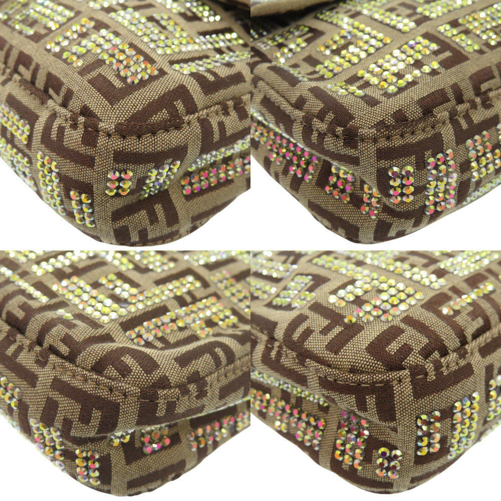 Decorative seat cushions with a pattern and rhinestone embellishments on a white background