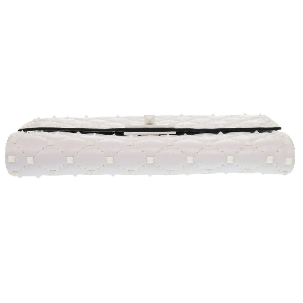 Rectangular mattress with white cover and black border on a white background