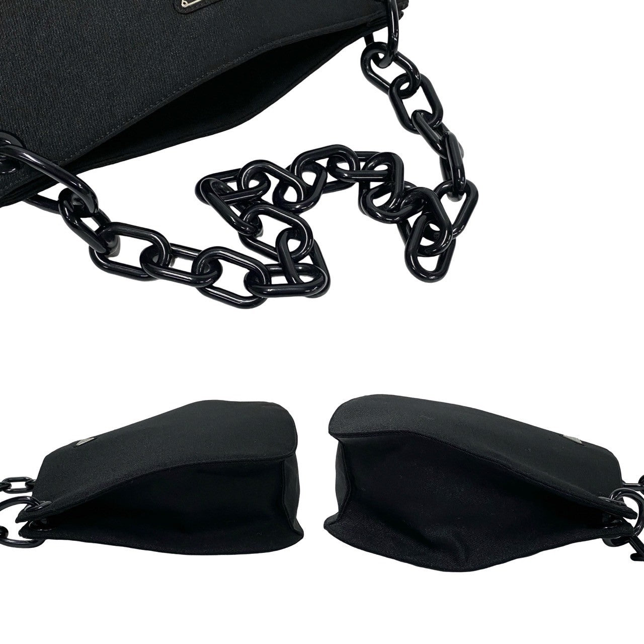 Black handbag with chain strap on a white background