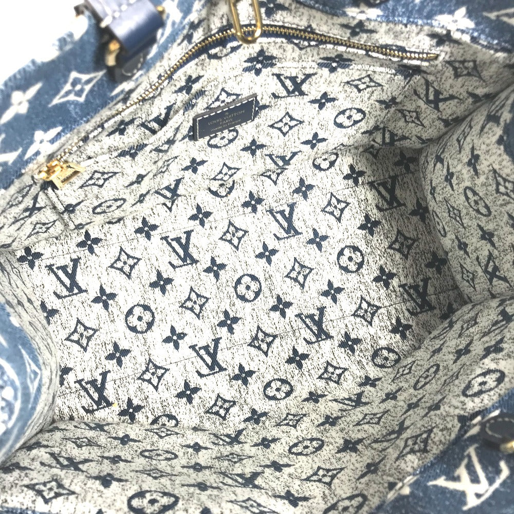 Close-up of a patterned bag with a prominent brand logo.