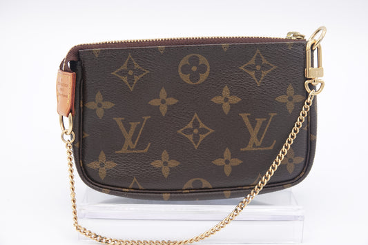 Louis Vuitton brown canvas  Monogram Mini Pochette Accessories gold hardware