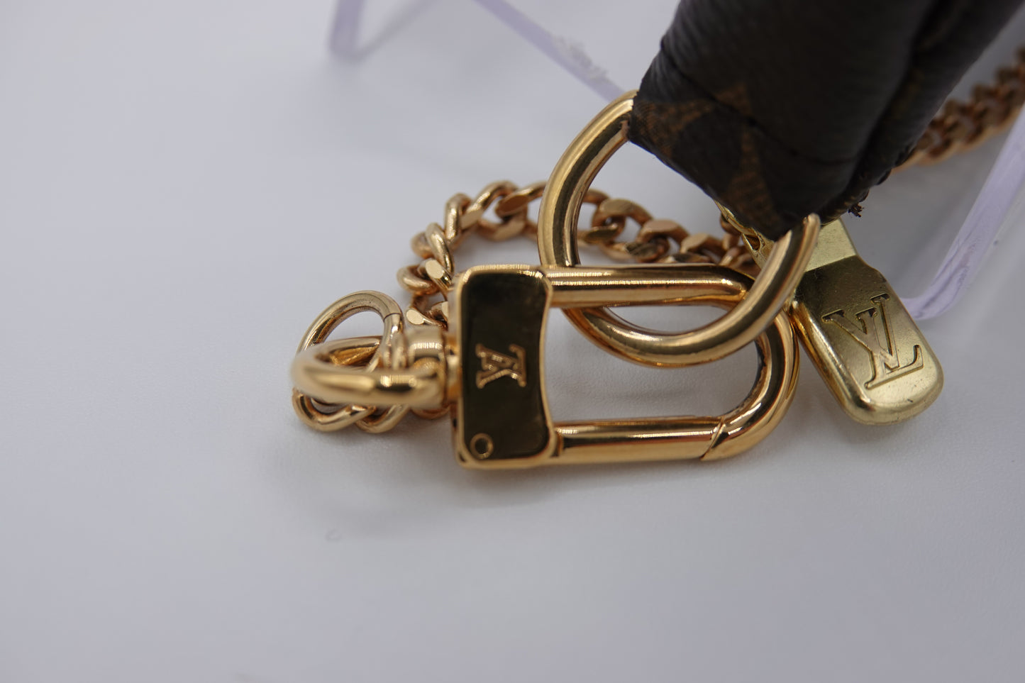 clasp Louis Vuitton brown canvas  Monogram Mini Pochette Accessories gold hardware